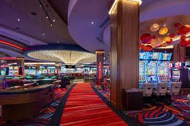 Antarmuka aplikasi dewa casino yang menampilkan menu utama dengan permainan slot dan pasar sportsbook